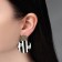 Earrings Assorted "ladies" parallels, black and white color in gold