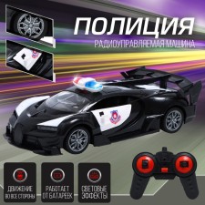 Radio -controlled “Police” machine, light, doors open, works from batteries