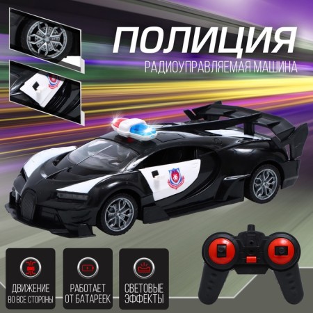 Radio -controlled “Police” machine, light, doors open, works from batteries