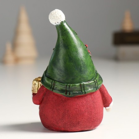 Polystone souvenir "Santa Claus in a cap with poinsettia, with a gift" 8.5x7.5x12 cm-2
