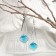 Hanging earrings with rhinestones "drop with a rhombus", blue color in silver, 7.2 cm