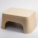 Children's stool-stand with a rubberized embossed surface, the color of mix