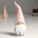 Polystone souvenir "Santa Claus in a pink cap, the cap pulled over" 8.5x8x20.5 cm