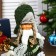 Interior doll "Girl with pigtails in a green coat and green hat" 36x8x13 cm