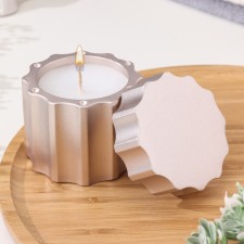 A candle in a candlelight made of gypsum with a lid with wide faces, 7.5x8.5 cm, champagne