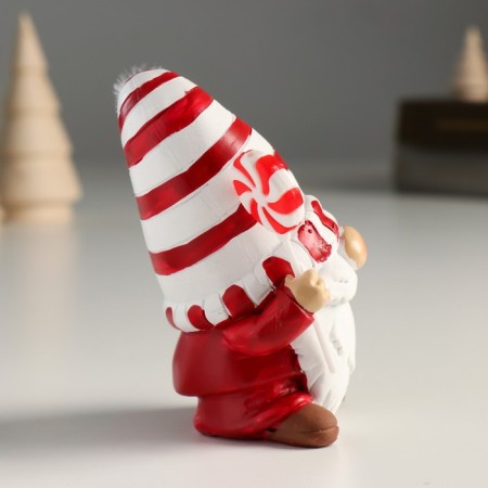 Polystone souvenir "Santa Claus in a white cap in red striped, with a candy" 9x6.5x10 cm-1