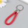 Keychain metal to the leatherette "strap" red 10x4 cm