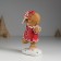 Polystone souvenir "Piery in a red dress, with a candy" 10x5x14 cm