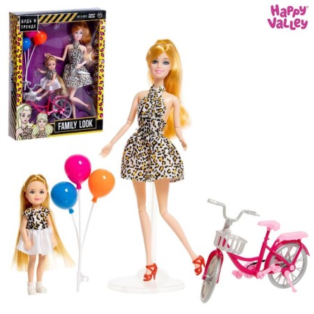 Model doll with Family Look daughter on a bicycle, leopard