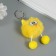 Fluffy on the ring "oblique eyes" yellow 9.5x6x6 cm