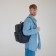 City backpack, textura made of artificial leather with zipper, outer pocket, blue color