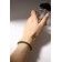 Bracelet with rhinestones "shine" on a puff, emerald color in gold