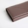 Women's wallet on a magnet, the color is pink-brown