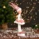 New Year's jester "in a dress with sequins and fur" 30 cm, pink-white