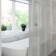 The bathroom curtain Meiwa Metro, 182 x 182 cm, the color is transparent