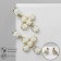 Earrings Assorted "Flowers" in crosses, white color in gold