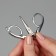 Scissors are manicure, folding, straight, 10.5 cm, silver color