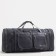 Road bag on a zipper, with an increase, 4 outer pockets, a long belt, the color is gray