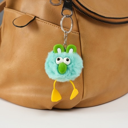 Fluffy on the ring "Bright -eyed raven" Green 9.5x6x6 cm