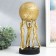 Souvenir Polystone "Atlanta with a ball" gold 12.5x12.5x32 cm