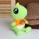 Soft toy "dinosaurus" in a jacket with a rainbow, 20 cm
