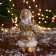 Santa Claus "in a cap, with a gift" 17 cm, gold