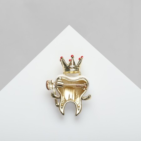 Brooch "King tooth", colored in gold-1
