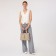 Luggage bag on lightning, 2 outer pockets, beige color