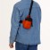 Slong bag from textiles, orange color