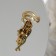 Brooch "Cat is graceful", green color in black gold