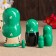 Matryoshka "God's cow", green dress, 5 puppet, 10-12 cm
