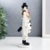 Polystone souvenir "Clown in a striped suit" Black and white with gold 18x7x10 cm