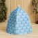 A cap for a bath with a print "Water Dragon", blue, polyester felt