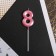 Candle for the cake, the number "8", pink.