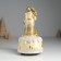 Souvenir Polystone Music "Santa Claus in a brown fur coat with a Christmas tree" 10x10x18 cm