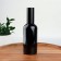 A bottle for storage, with a sprayer "Black", 100 ml, black color