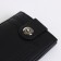 Male purse on a magnet, black color