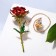 A brooch with an icon on the chain "flower" rose, the color is red-green in gold