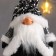 Interior doll "Santa Claus in a black fur coat and cap with sequins" 41x11x16 cm