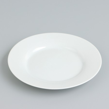 The plate is white, ceramic, dined d = 15 cm-2