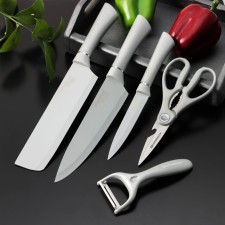 A set of BLADES kitchen supplies, 5 objects: 3 knives, vegetable vegetables, scissors in the kit, white color