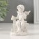 Souvenir Polystone "Angel on a fence" 9x6x4 cm