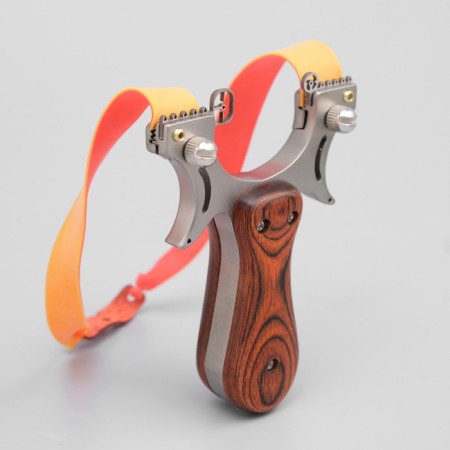 A slingshot with a wooden pen and sight, mix-1