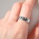 The ring "seven" horseshoes, the color is black in silver, dimensionless