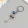 Keychain from the evil eye Metal "Key with the Hot" 2.8x5.7 cm