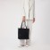 Bag-tout on lightning, the color is dark blue