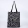 A shop bag on a rave without a zipper, without lining, black color