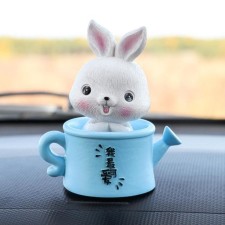 Bunny on a car panel shocking his head, C6