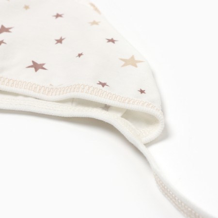 A set for newborns (swing/slider/cap), white/stars, height 62-6