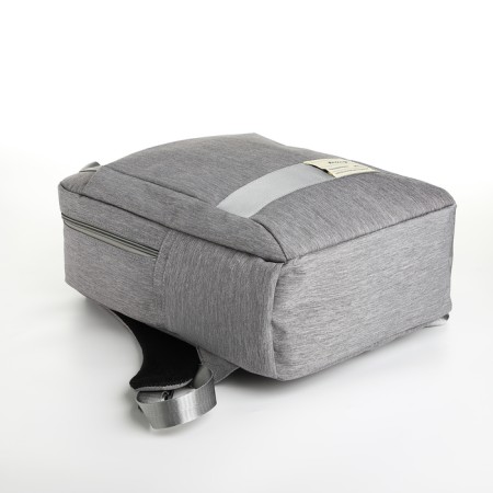 A backpack of textiles on a zipper, 3 pockets, a laptop, color gray-4